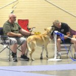 Forrest Lyons with Rustle loving on the Show Secretary, Dave Schiller